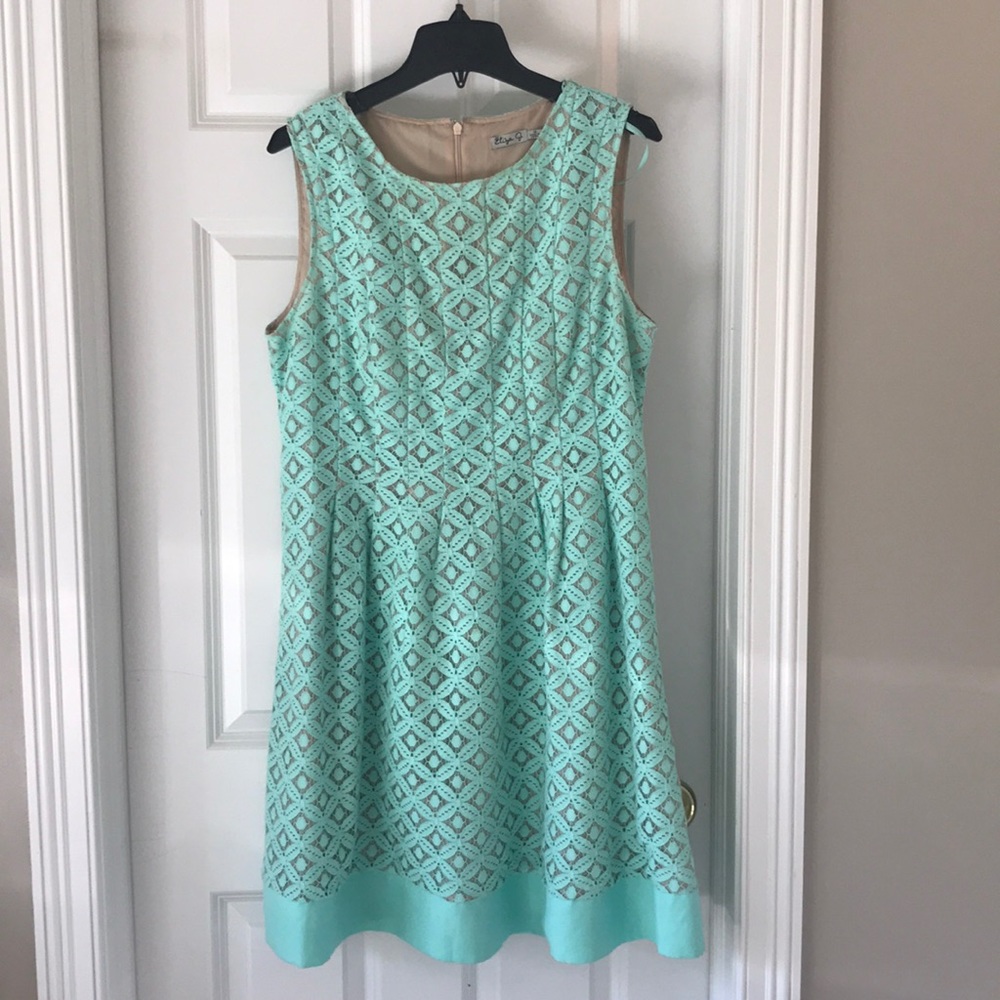 Mint green lacy dress with tan backing.